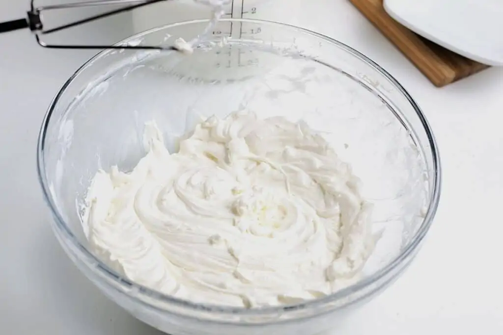 A clear bowl of cream mix.