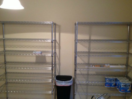 Pantry shelves lined against the wall.