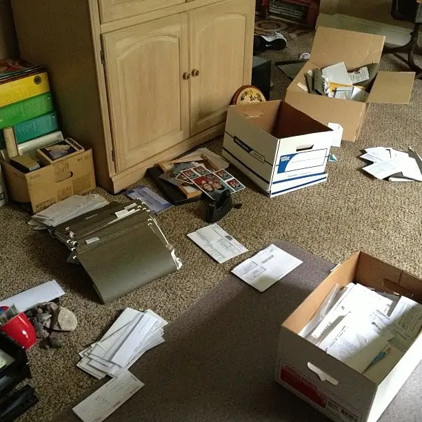 Several boxes scattered everywhere on the floor. 