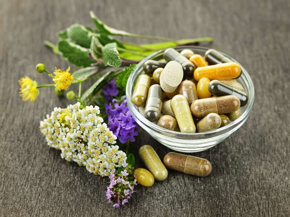 Herbs with alternative medicine herbal supplements and pills