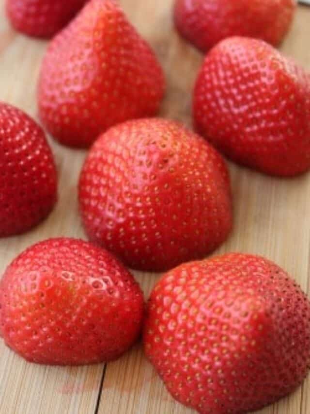 Plate of cut strawberries.