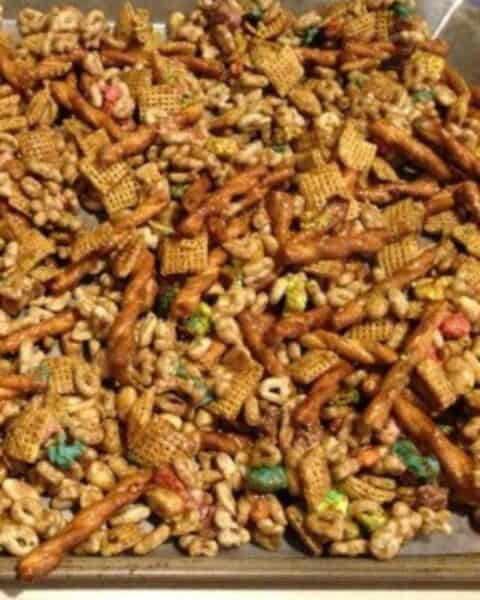Pan of trail mix with green food for St Patrick's Day.