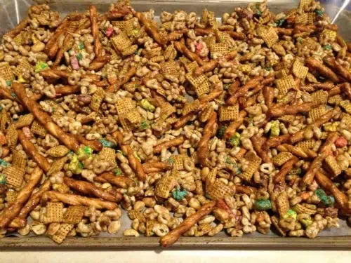 Pan of trail mix with green food for St Patrick\'s Day.