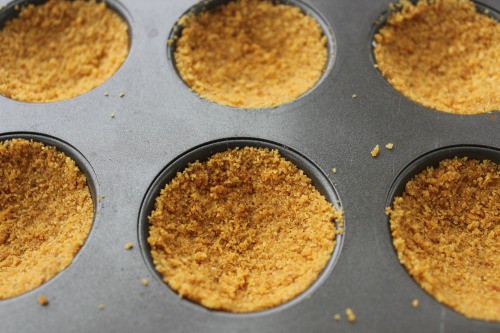Graham cracker in muffin tins.