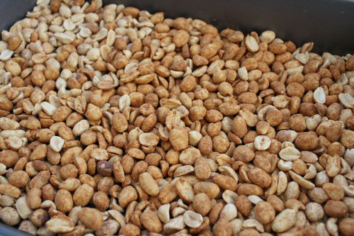 A bowl of roasted peanuts.
