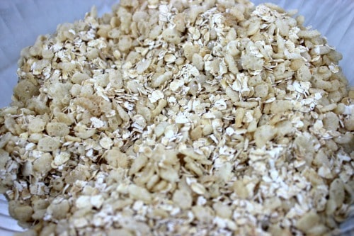Oats and brown sugar mixed together with dry ingredients for the peanut butter granola bars recipe.