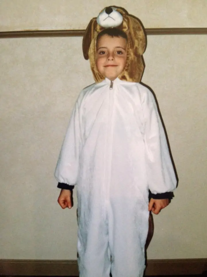 A little boy dressed as a bear for Halloween.