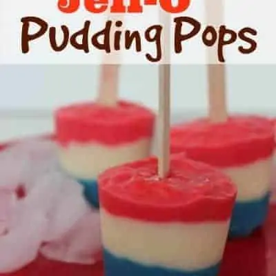 Patriotic red, white, and blue Jell-O Pudding Pops on a red plate.