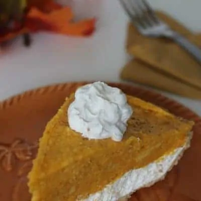 No Bake Pumpkin Pie slice on a serving tray.