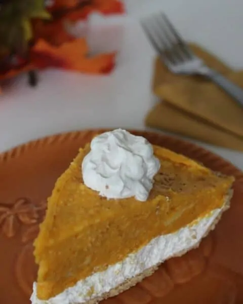 No Bake Pumpkin Pie slice on a serving tray.