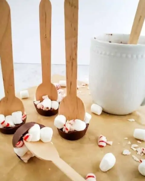 Christmas hot chocolate spoons with peppermint bark and marshmallows.