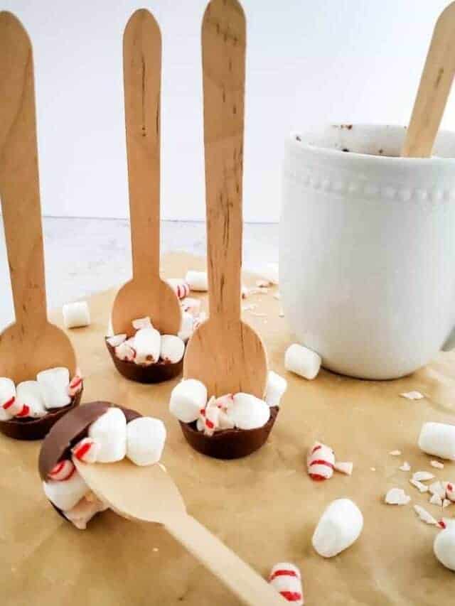 Christmas hot chocolate spoons with peppermint bark and marshmallows.