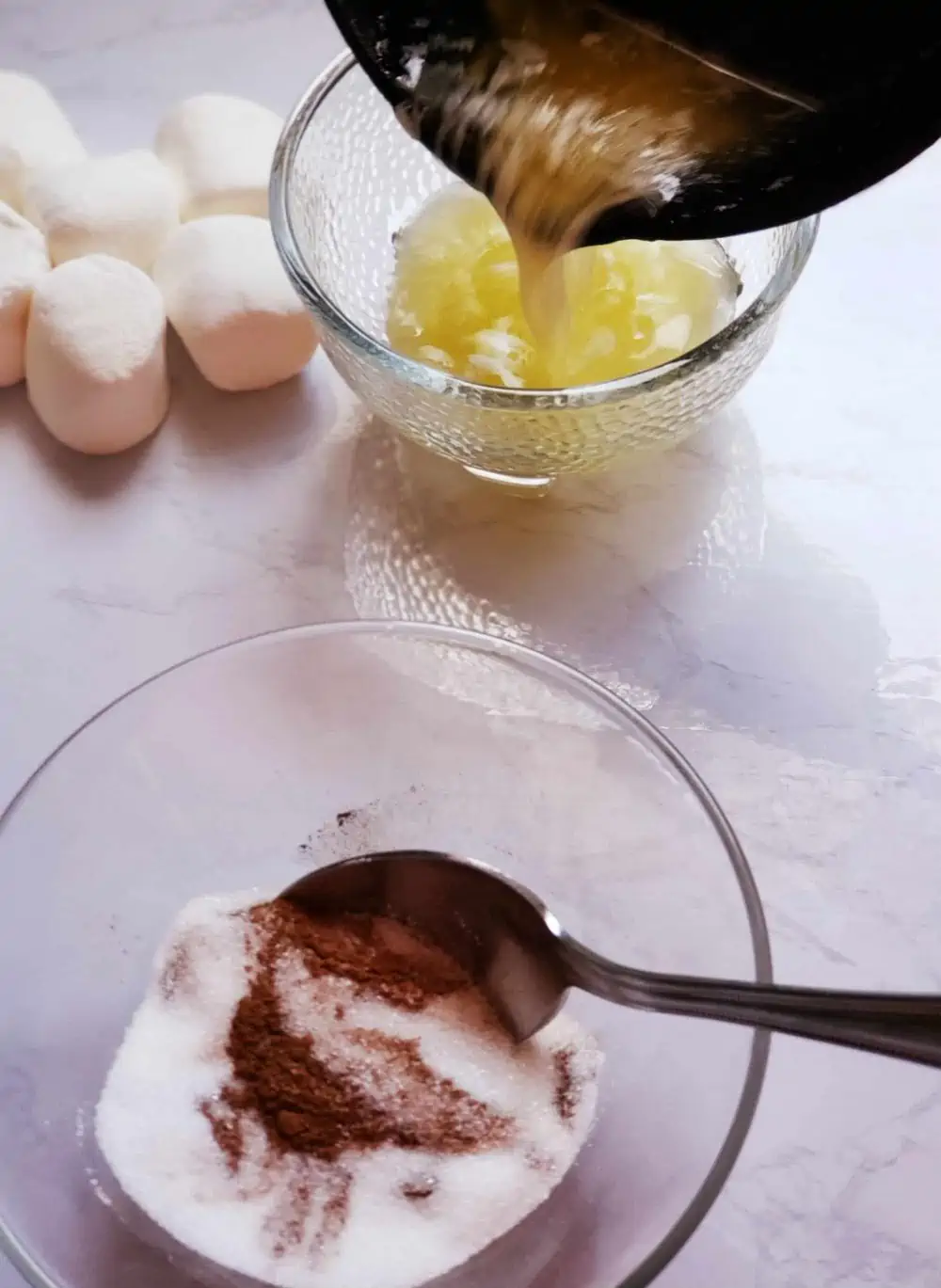 Melted butter with marshmallows for Resurrection Rolls Recipe