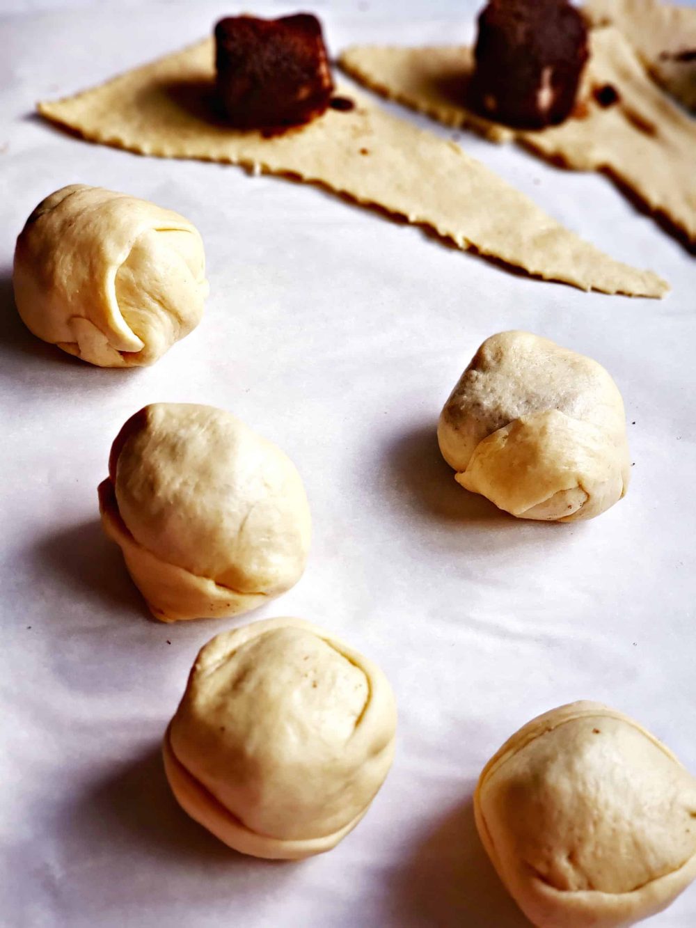 Wrap the marshmallow in the crescent roll. 