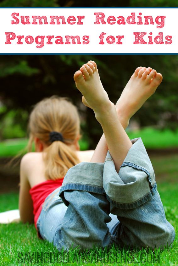 A little girl that is in the grass