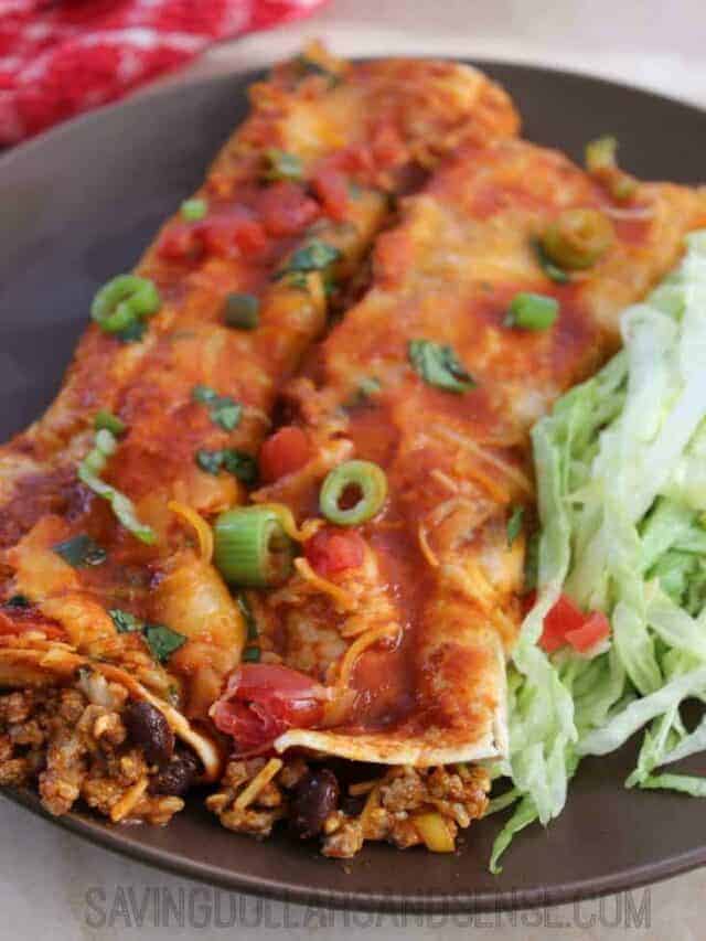 Homemade beef enchiladas with a side of shredded lettuce.