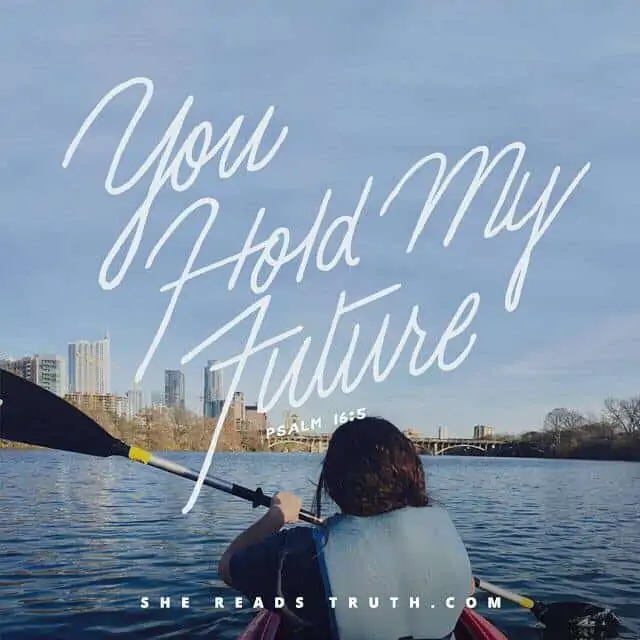 A person sitting in a boat on a body of water with the title \"You Hold My Future.\"