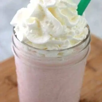 Copycat Cotton Candy Frappuchino recipes from Starbucks in a mason jar with whip cream.