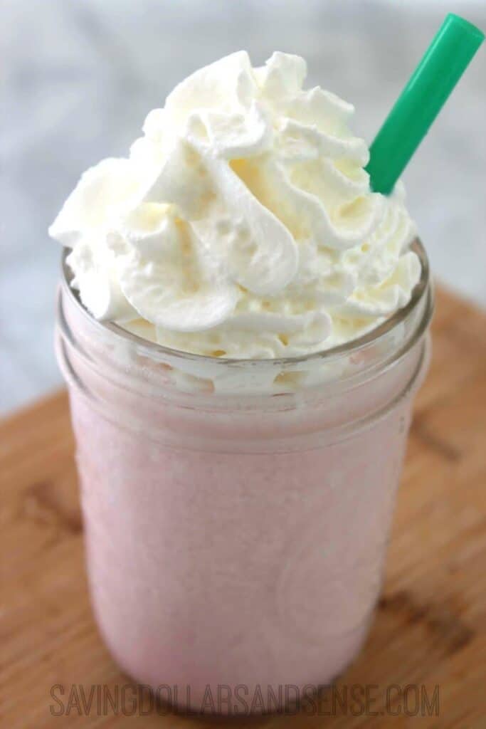 Copycat Cotton Candy Frappuchino recipes from Starbucks in a mason jar with whip cream.