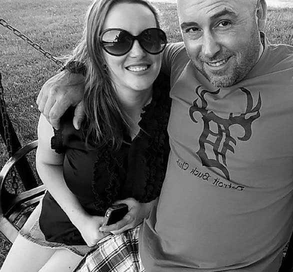 A couple of people posing for the camera