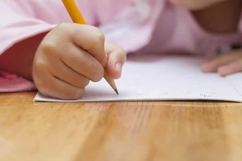  little girl doing her homework