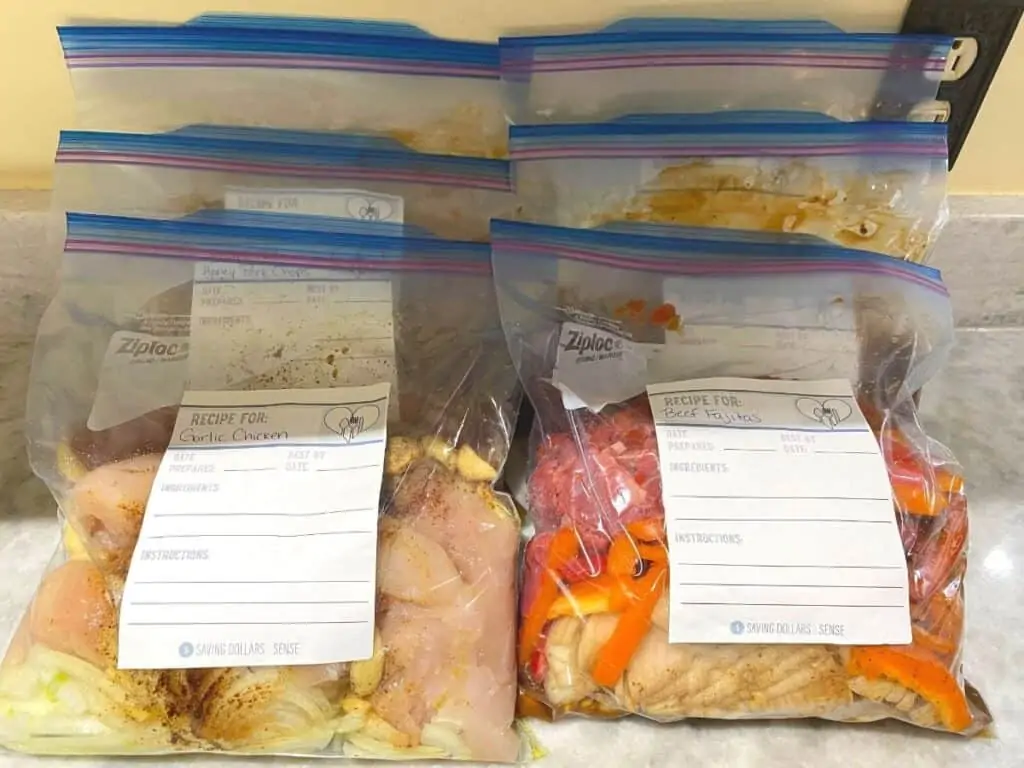 Several gallon freezer bags with recipes for each meal.