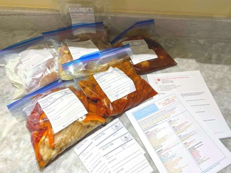 Gallon freezer bags with means and recipes ready for each dinner.