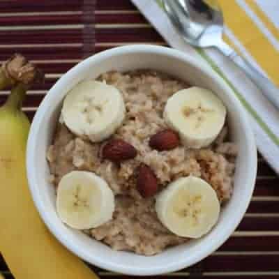 Crock Pot Steel Cut Oatmeal with bananas and nuts in the bowl.