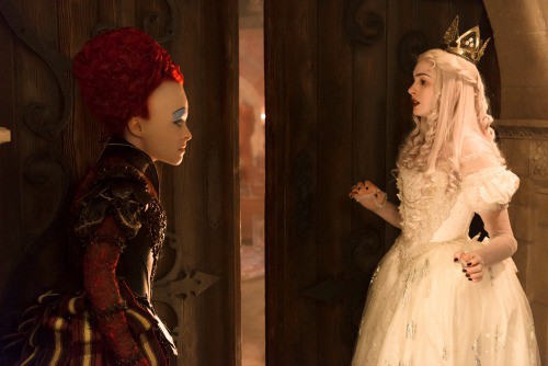 Helena Bonham Carter is the Red Queen and Anne Hathaway is the White Queen in Disney's ALICE THROUGH THE LOOKING GLASS, an all new adventure featuring the unforgettable characers from Lewis Carroll's beloved stories.