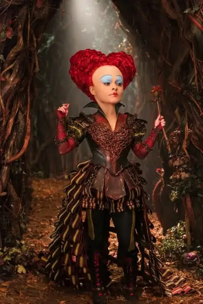 Alice (Mia Wasikowska) returns to the whimsical world of Underland and encounters the Red Queen (Helena Bonham Carter) in Disney\'s ALICE THROUGH THE LOOKING GLASS, an all-new adventure featuring the unforgettable characters from Lewis Carroll\'s beloved stories.