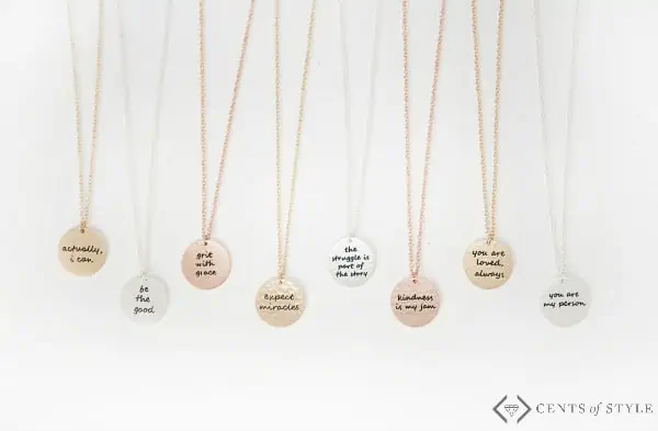 Circle necklace with motivational phrases and quotes.