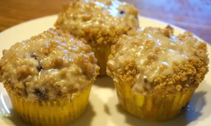 Cream Filled Berry Streusel Muffins with Lemon Glaze