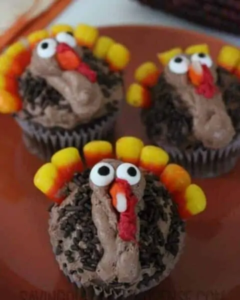Thanksgiving turkey cupcakes with candy corn and frosting.