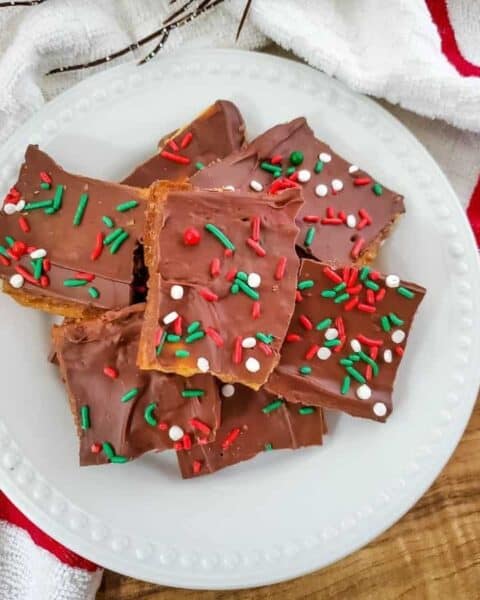 A plateful of baked Christmas crack candy.