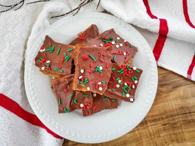 A plateful of baked Christmas crack candy.