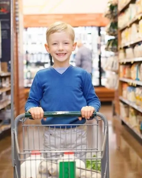 boy in a grocery store