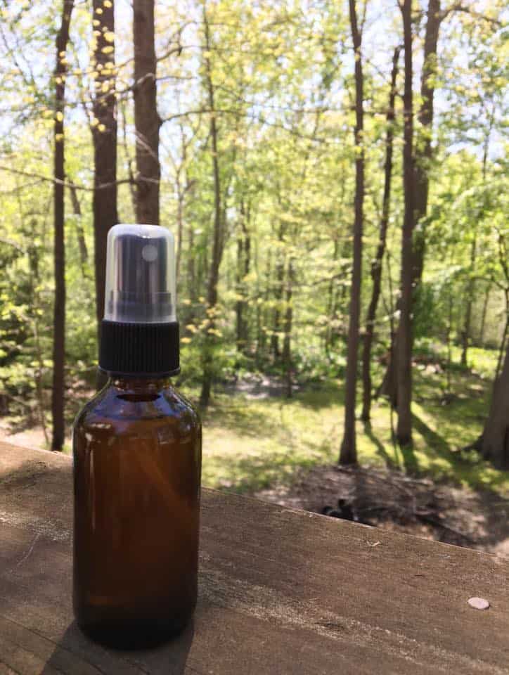 A bottle next to a forest
