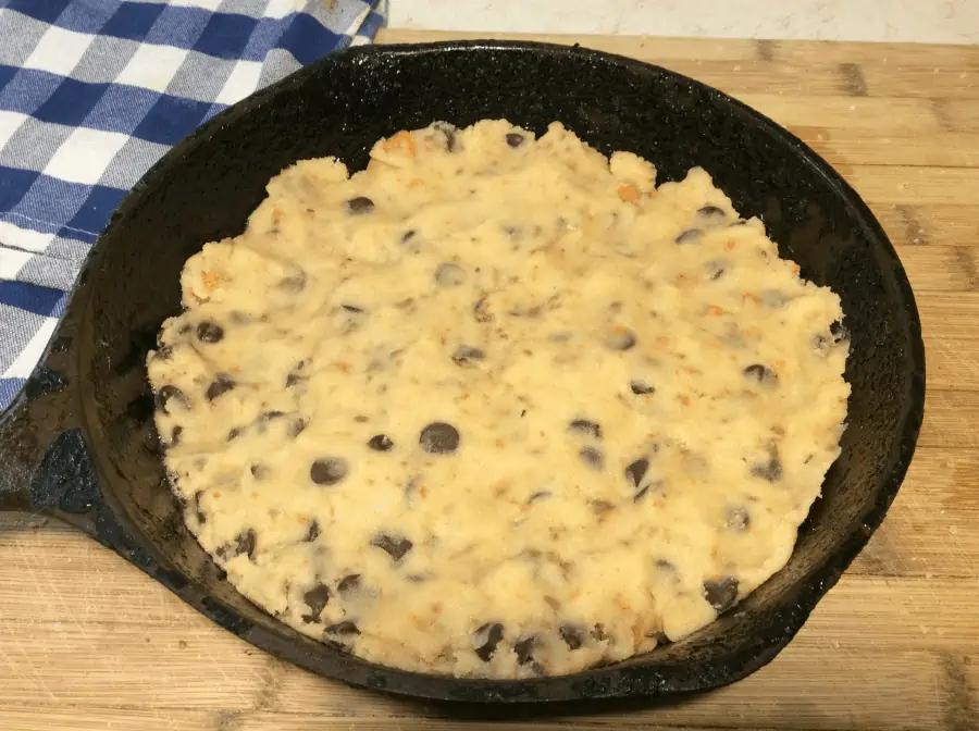 cookie dough in cast iron skillet.