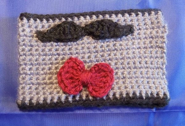 Mustache and bow tie cuff cozy for mug