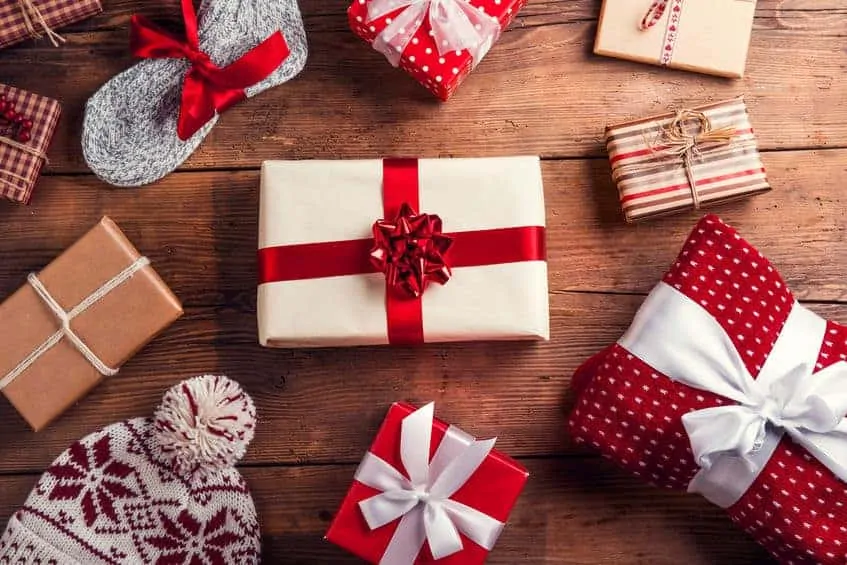 Scattered Christmas presents on the floor.