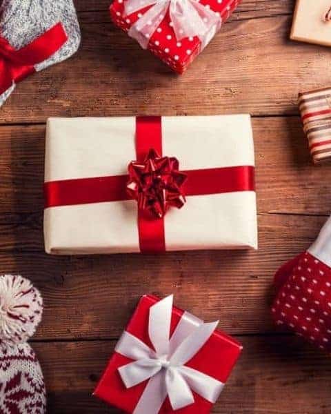 Scattered Christmas presents on the floor.