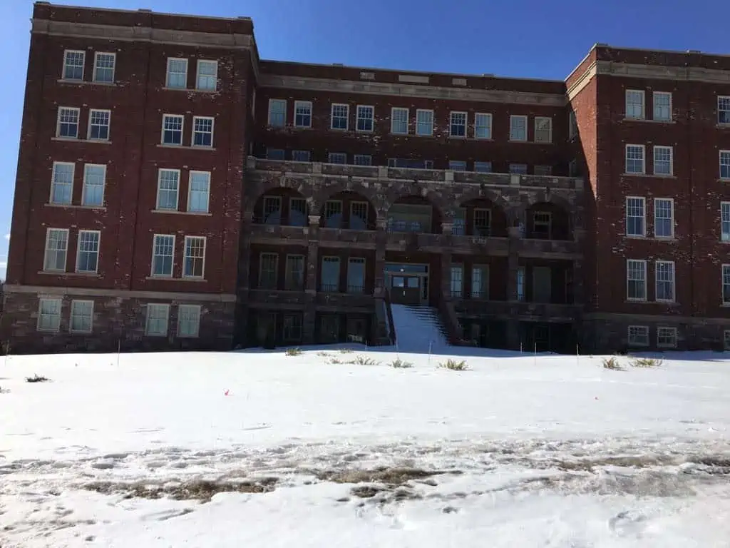 An orphanage covered in snow.