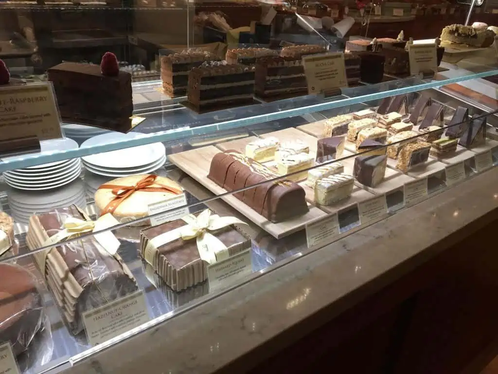 A bunch of delicious desserts, mostly chocolates, on display behind a counter in Chicago.