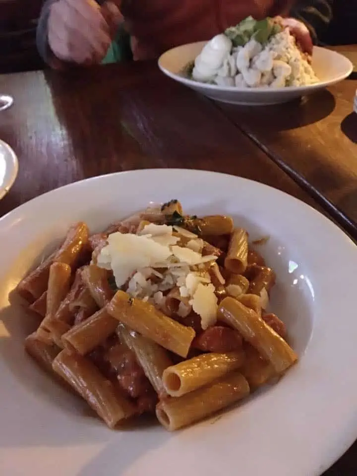 A plate of pasta on a table