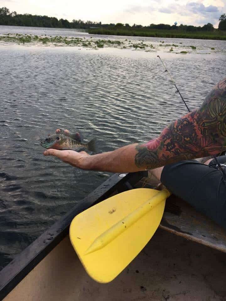 Fish in hand.