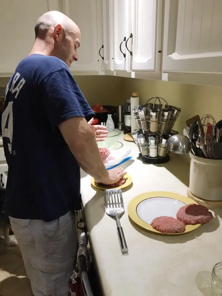 A person preparing food in a kitchen