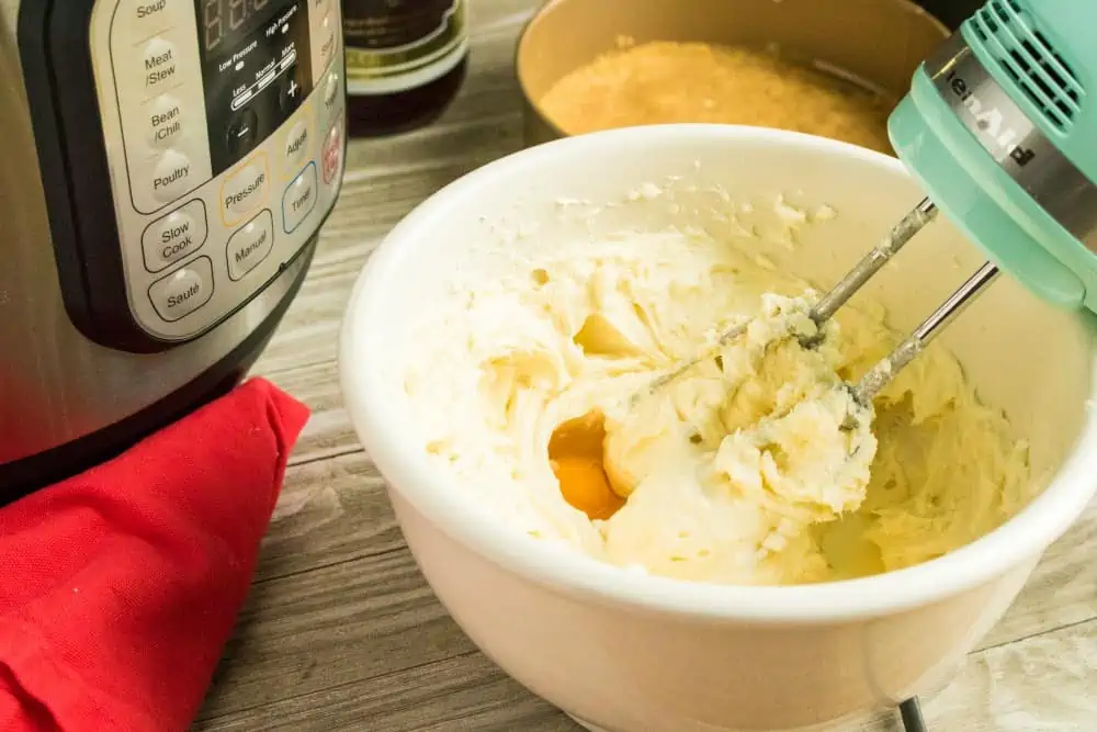 Mix the ingredients to prep the cheesecake for the Instant pot.