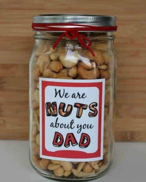 jar of nuts with a sticker that reads Nuts About Dad on the front of it.