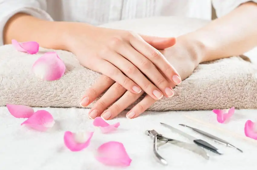 Woman with beautiful and well manicured nails.