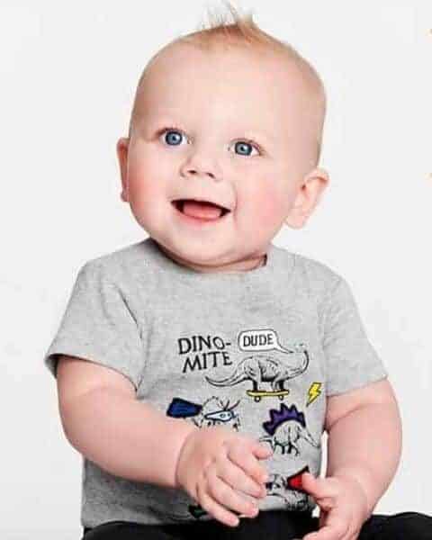 cute little baby sitting and smiling